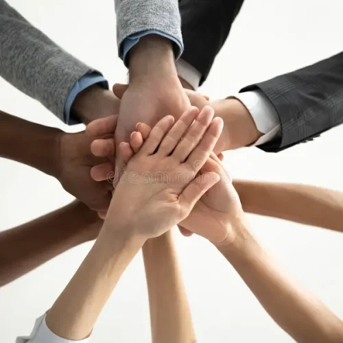 close-up-vertical-photo-diverse-business-people-stacking-hands-close-up-bottom-view-vertical-photo-diverse-business-people-184964845